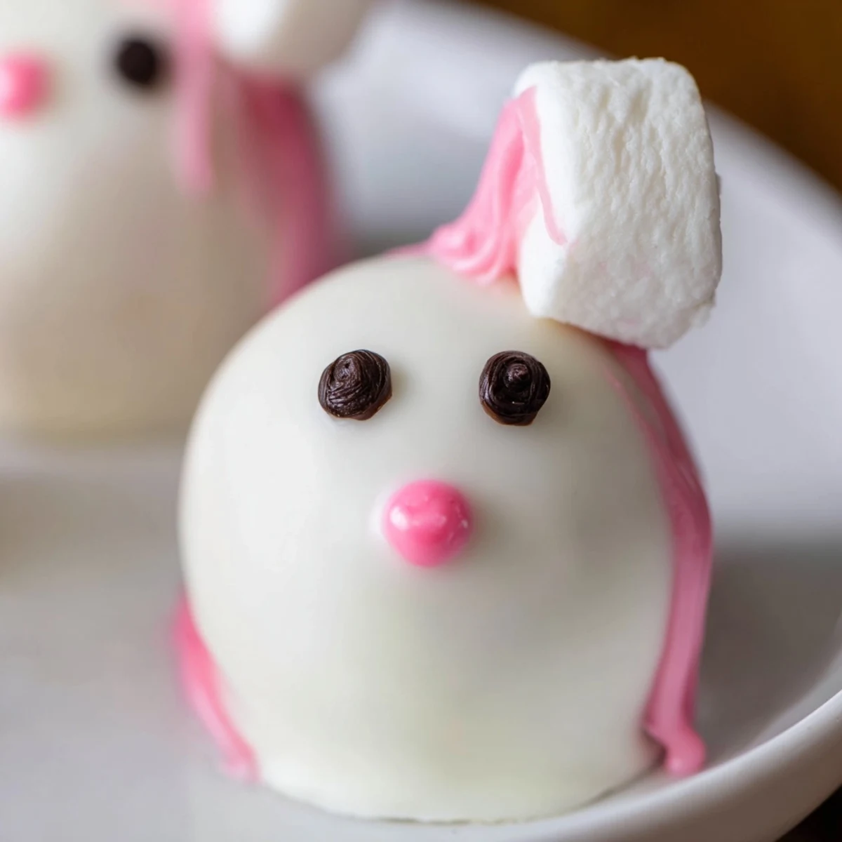 Creamy Oreo truffle balls shaped like bunny heads dipped in smooth white chocolate with colorful spring sprinkles