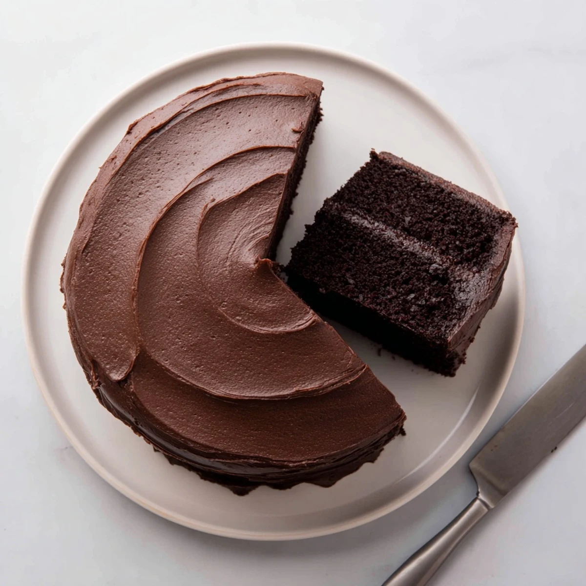 Homemade chocolate cake with whipped cocoa frosting perfect for birthday celebrations