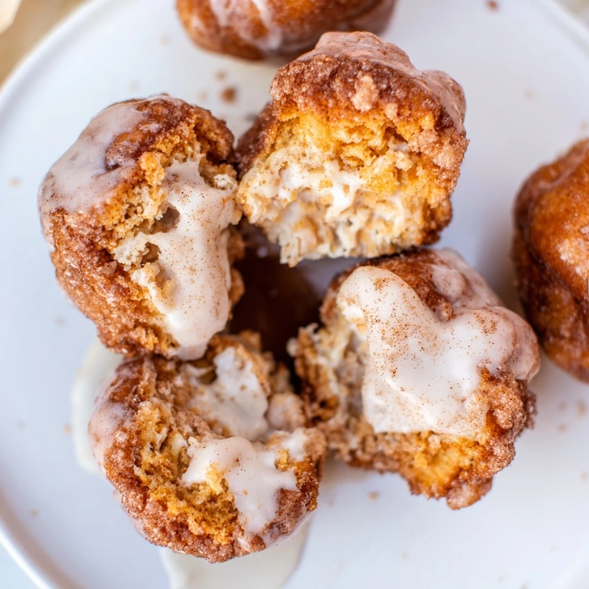 Warm pull-apart high protein no sugar monkey bread drizzled with vanilla yogurt glaze