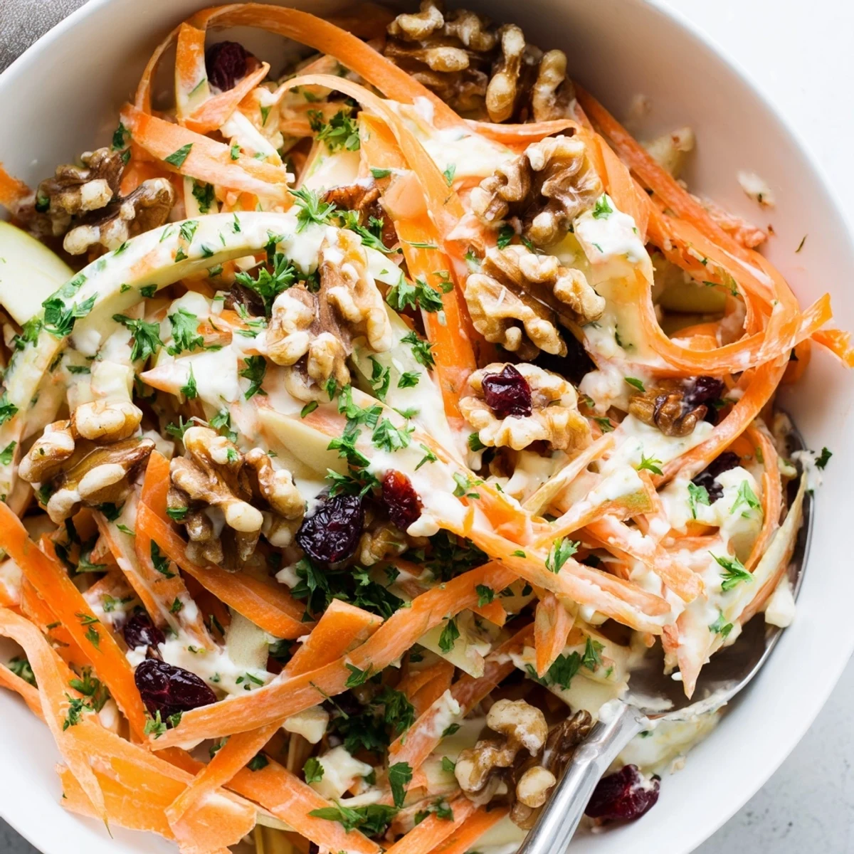 Crunchy Apple Carrot Salad With Creamy Citrus Dressing, zesty orange finish and toasted walnuts
