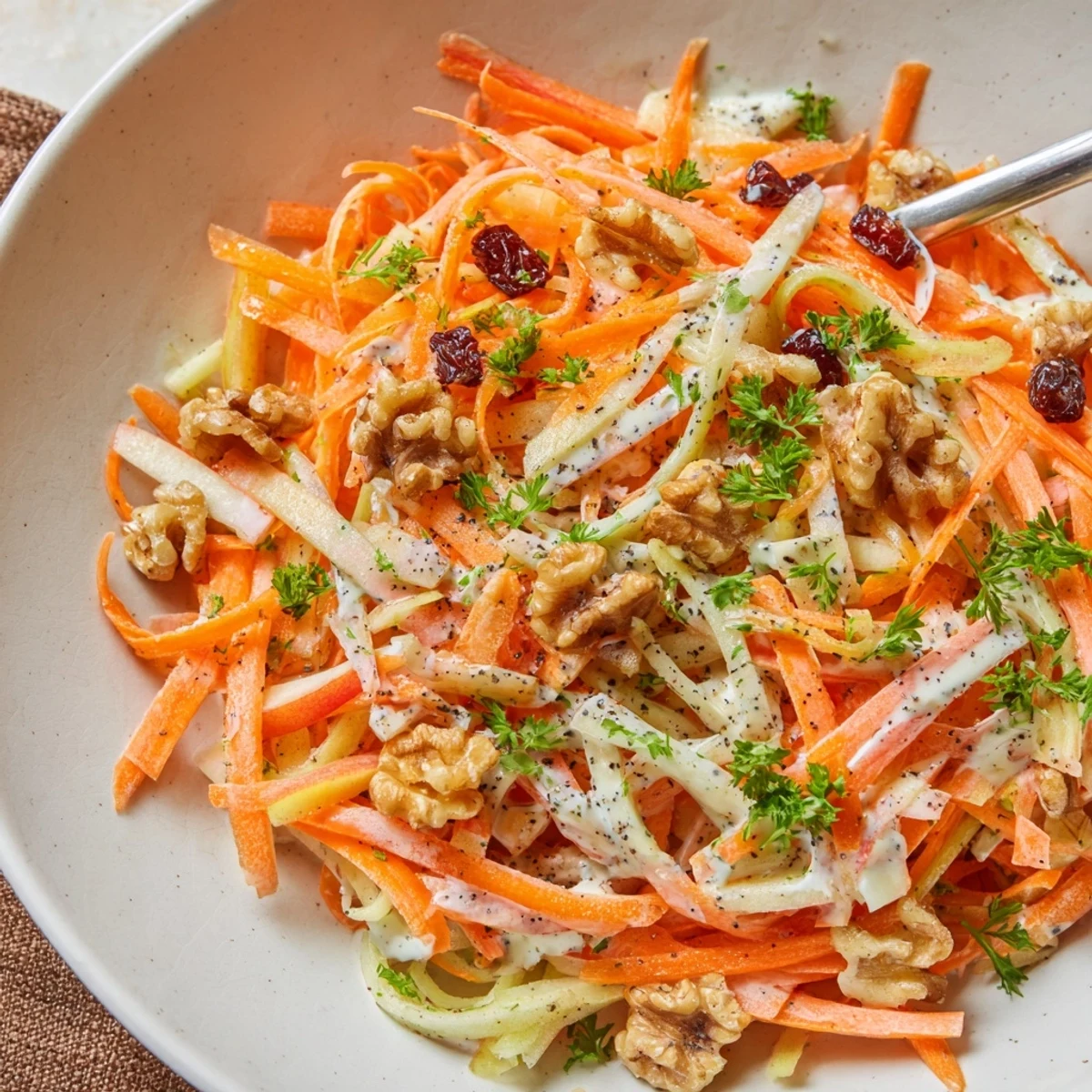 Crunchy Apple Carrot Salad With Creamy Citrus Dressing served chilled for a refreshing side