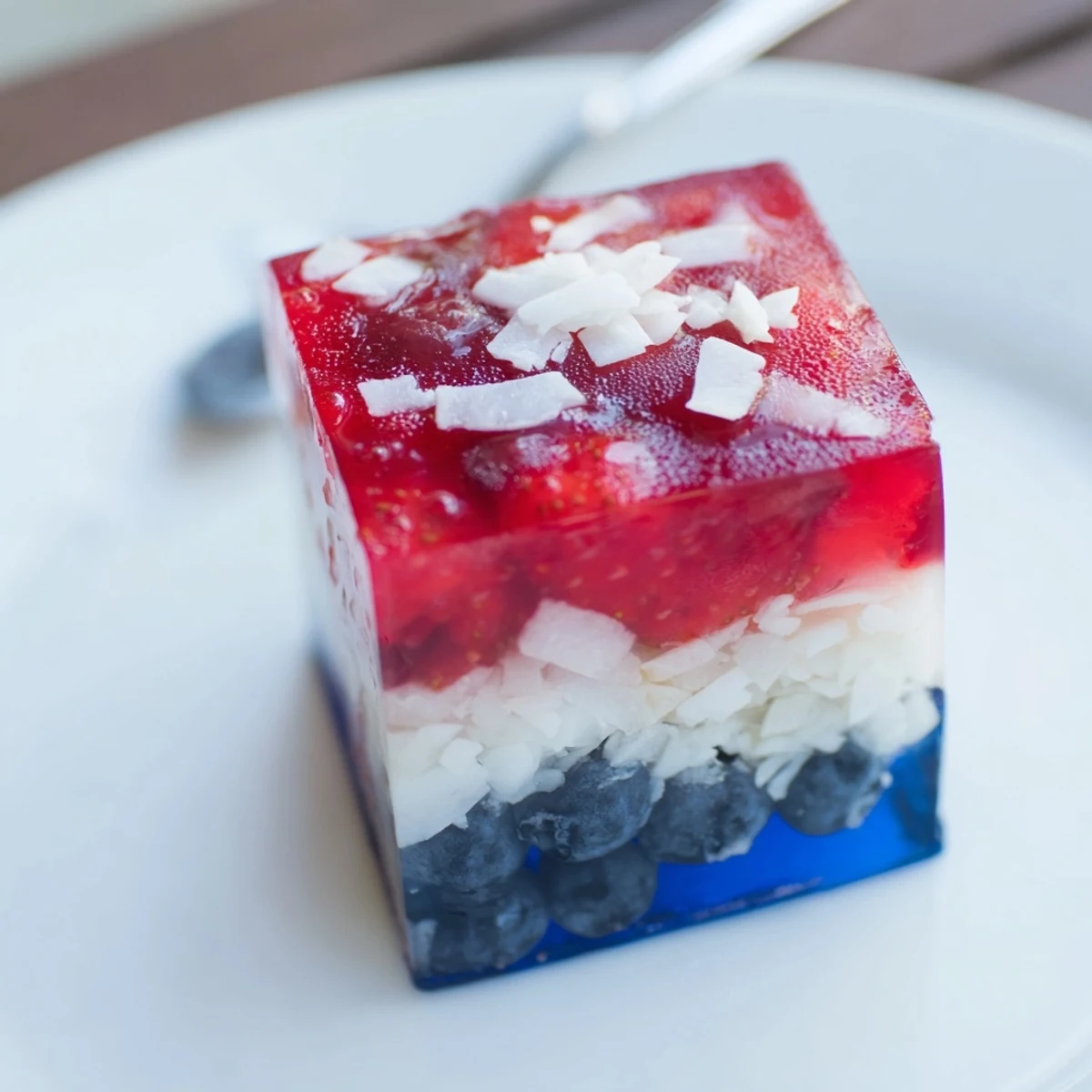 Red White And Blue Ice Cubes Recipe layered with berries and coconut, party-ready.