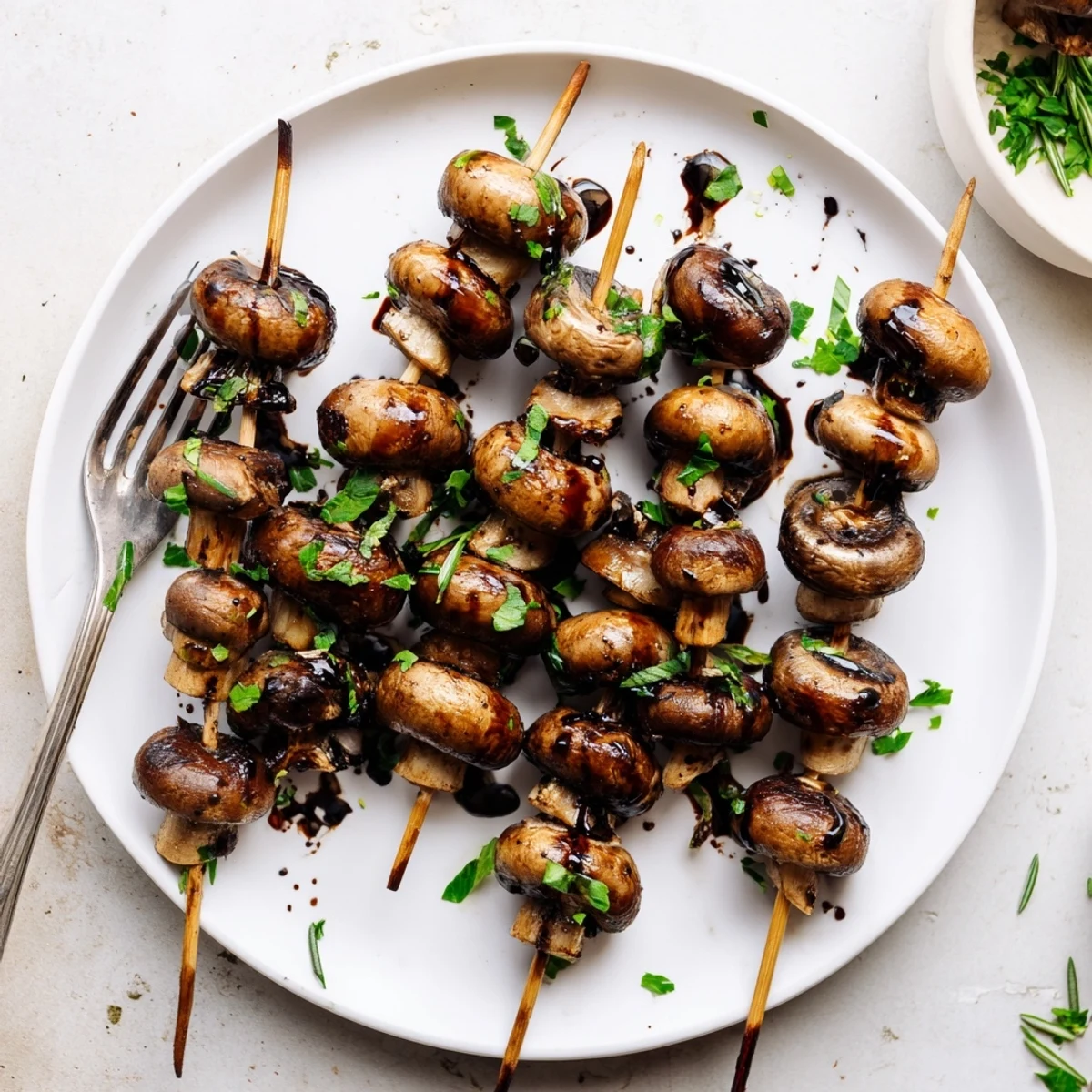 Balsamic Garlic Grilled Mushroom Skewers sizzling on grill, glistening with glaze.