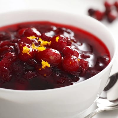 Freshly simmered Cranberry Sauce with Orange Juice, its ruby berries bursting and thickening to a perfect spoonable texture.